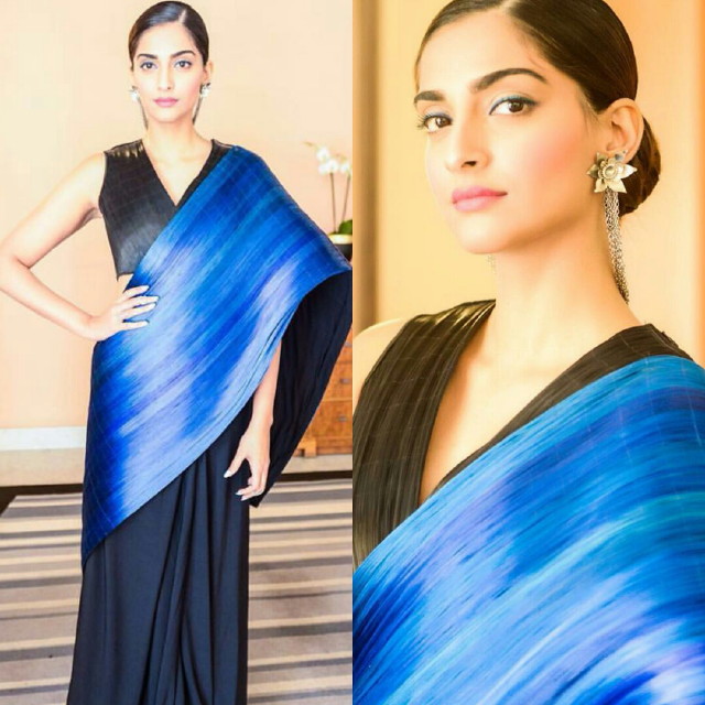 Royal blue and black sculpted sari by Rimzim Dadu for press interviews