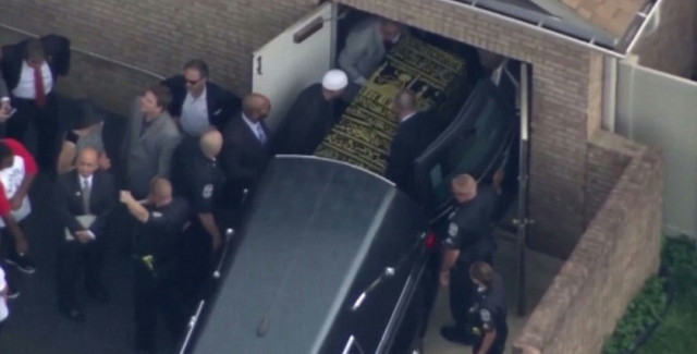 Muhammad Ali's body arrives at the funeral home. 